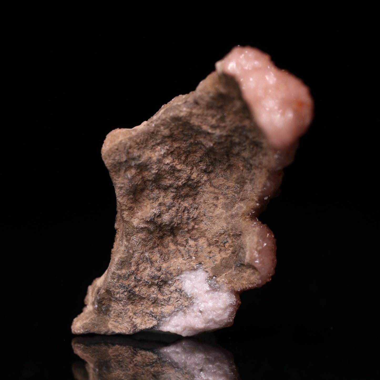 Curved Rhodochrosite Thumbnail, N'Chwaning I Mine, Kalahari Manganese Field, Northern Cape, South Africa.