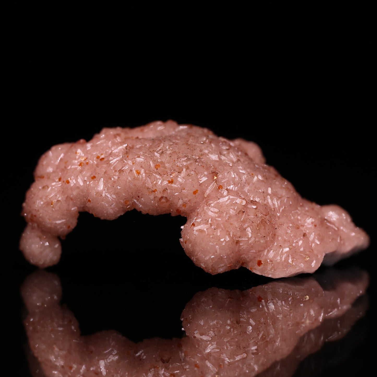 Curved Rhodochrosite Thumbnail, N'Chwaning I Mine, Kalahari Manganese Field, Northern Cape, South Africa.