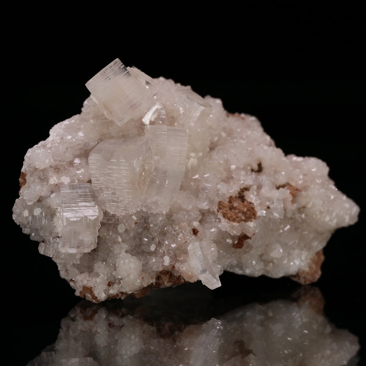Hydroxyapophyllite, Calcite on Matrix