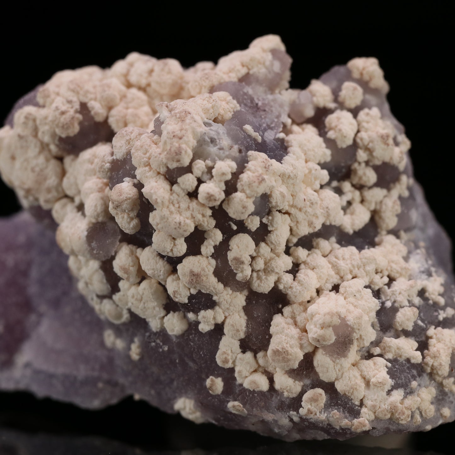 Calcite on Amethyst Quartz