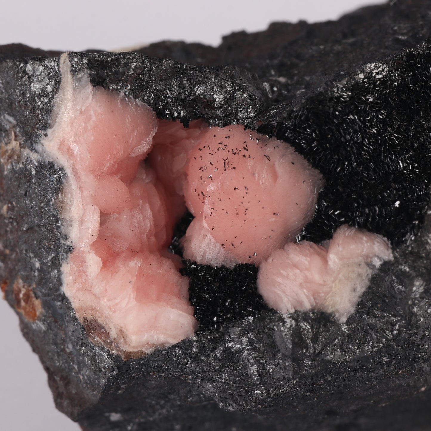Rhodochrosite on Manganite