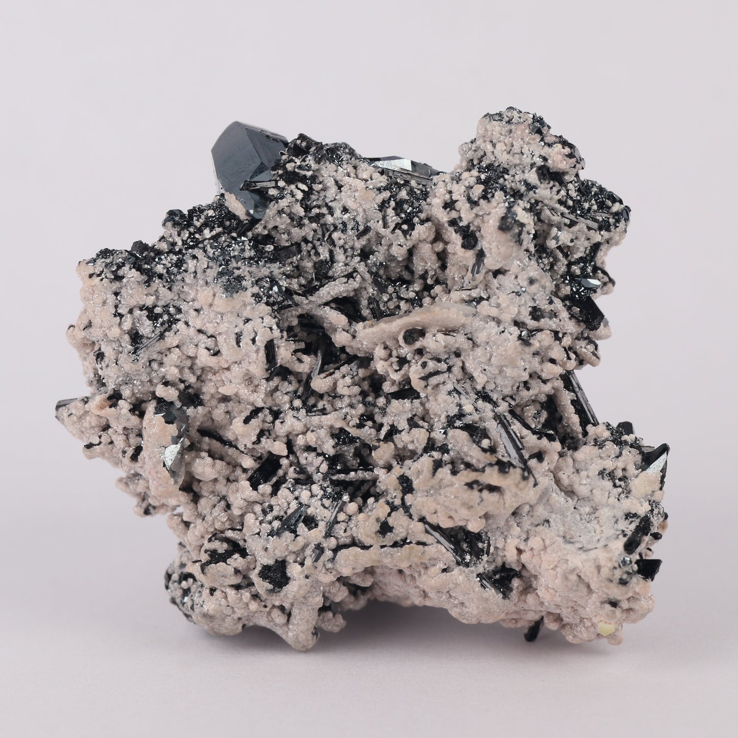 Brucite on Hematite on Gaudefroyite