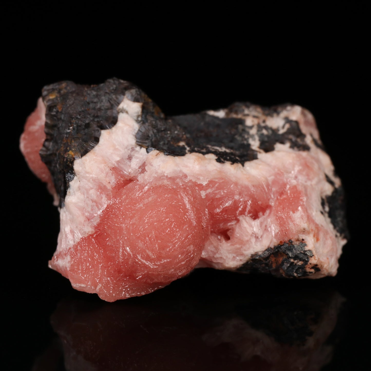 Rhodochrosite on Goethite