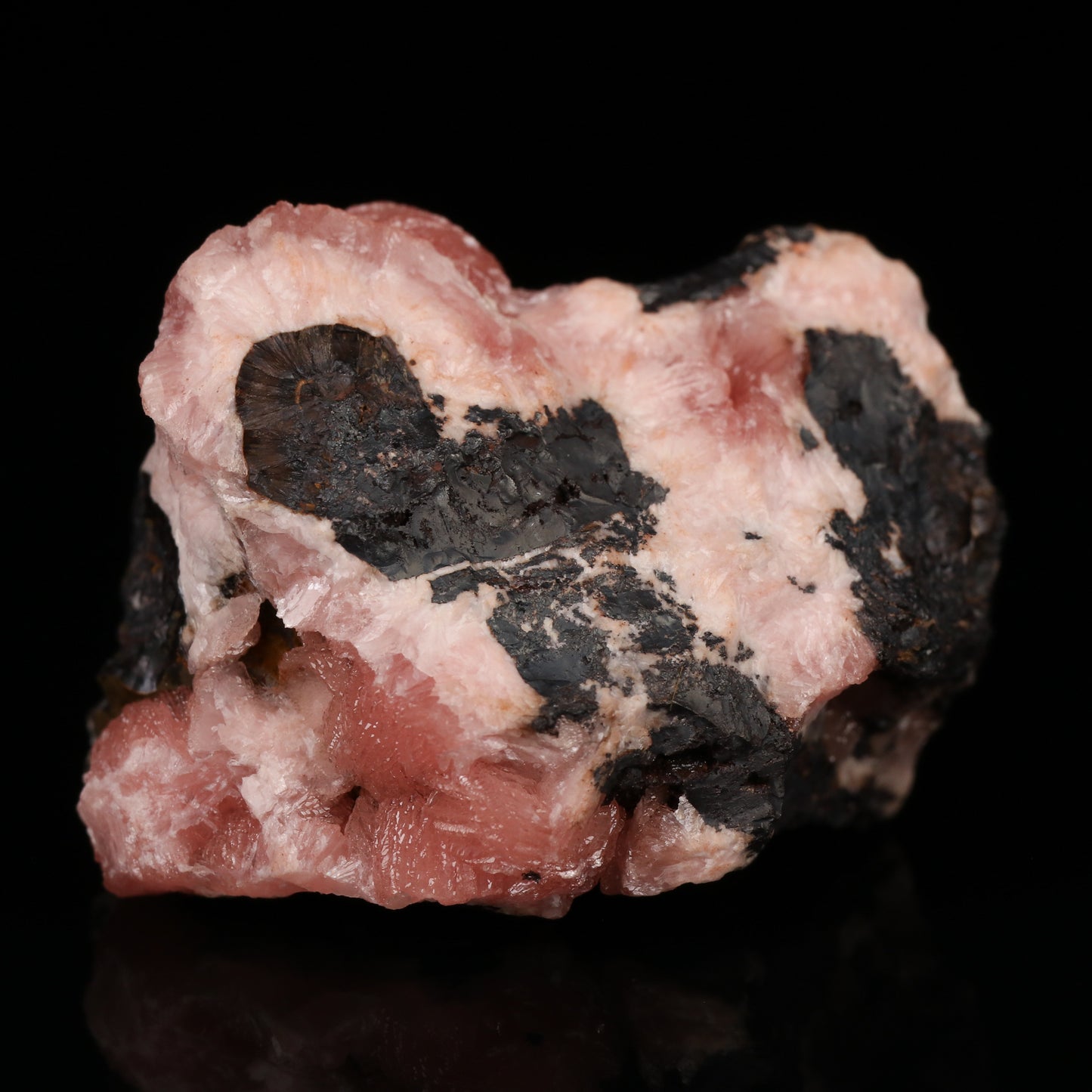 Rhodochrosite on Goethite