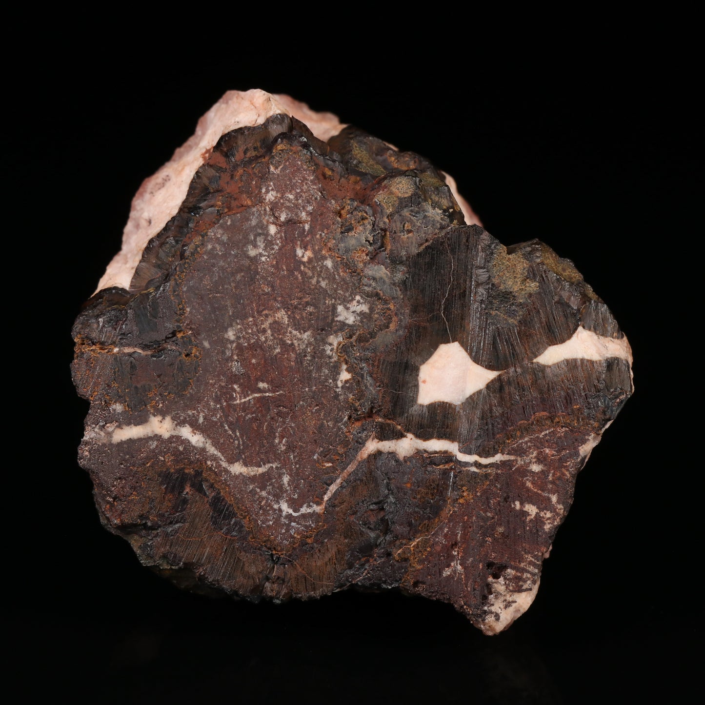 Rhodochrosite on Goethite