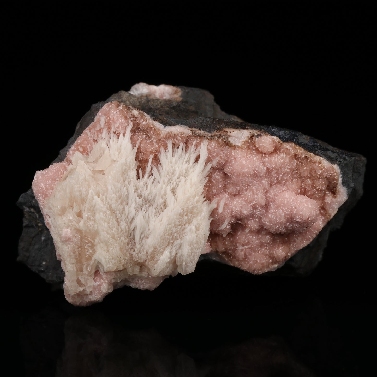 Calcite on Rhodochrosite on Matrix