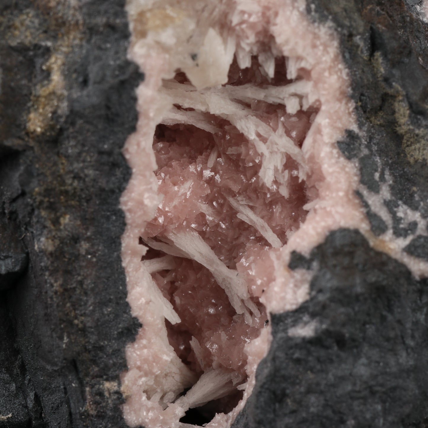 Calcite on Rhodochrosite on Matrix