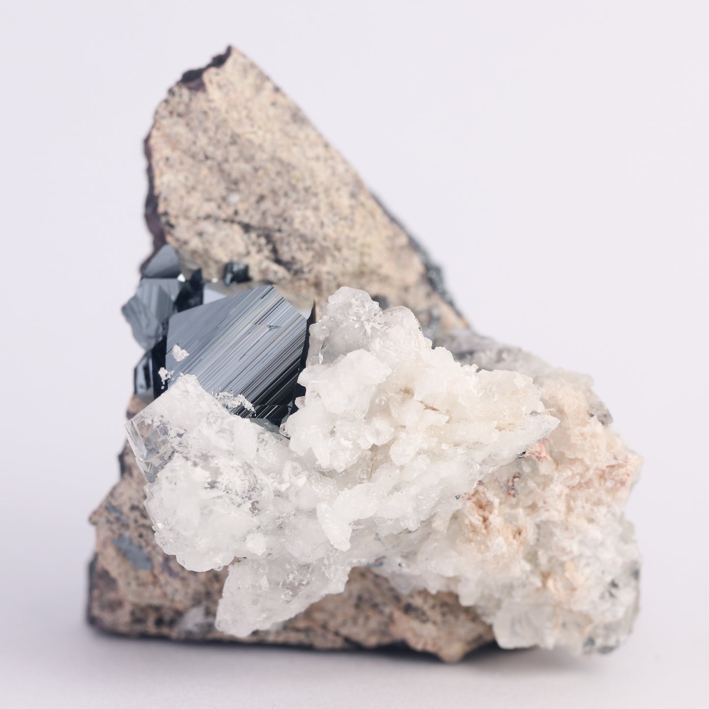 Calcite, Hematite on Matrix