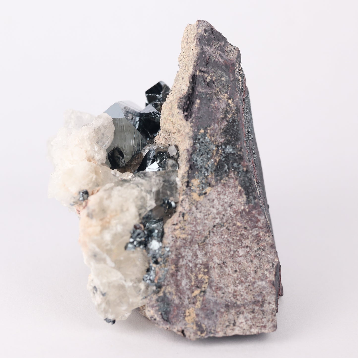 Calcite, Hematite on Matrix