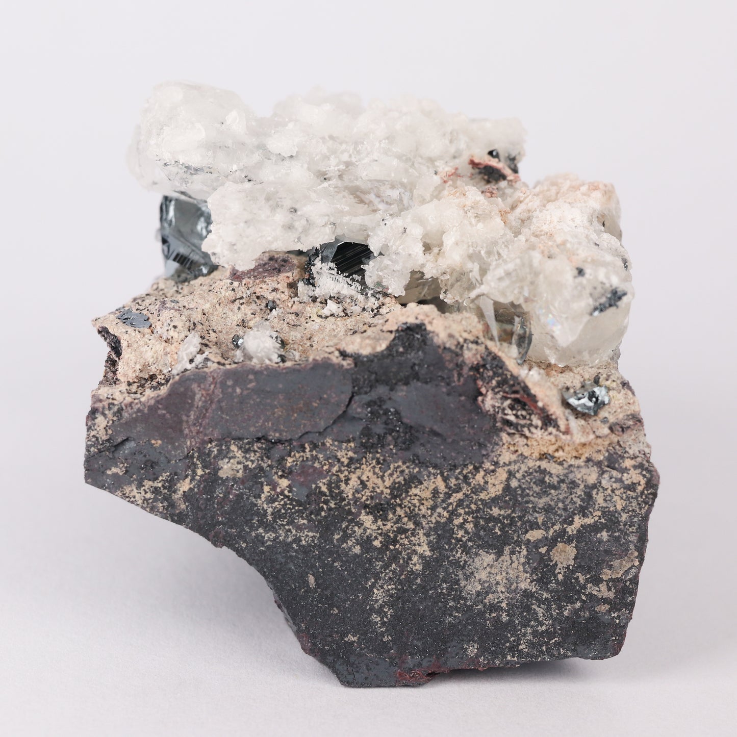 Calcite, Hematite on Matrix