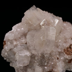 Hydroxyapophyllite, Calcite on Matrix