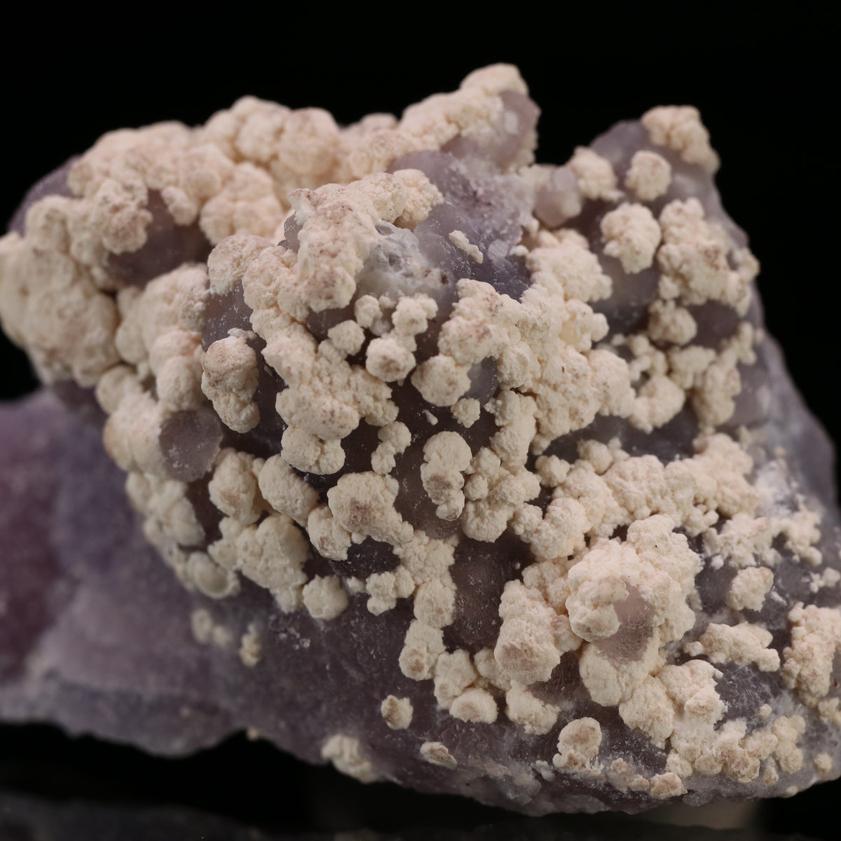 Calcite on Amethyst Quartz