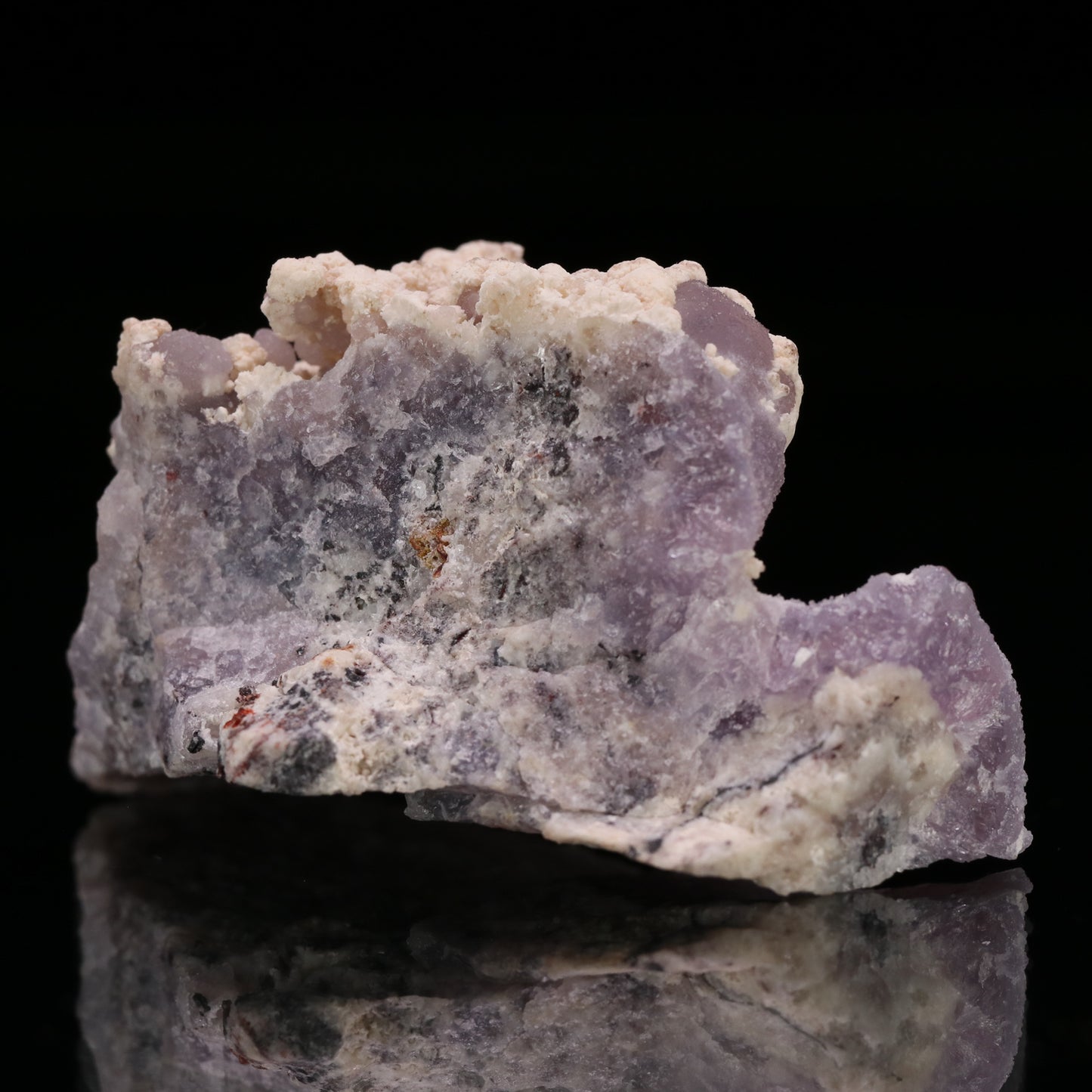 Calcite on Amethyst Quartz, N'Chwaning III Mine, Kalahari Manganese Field, Northern Cape, South Africa.