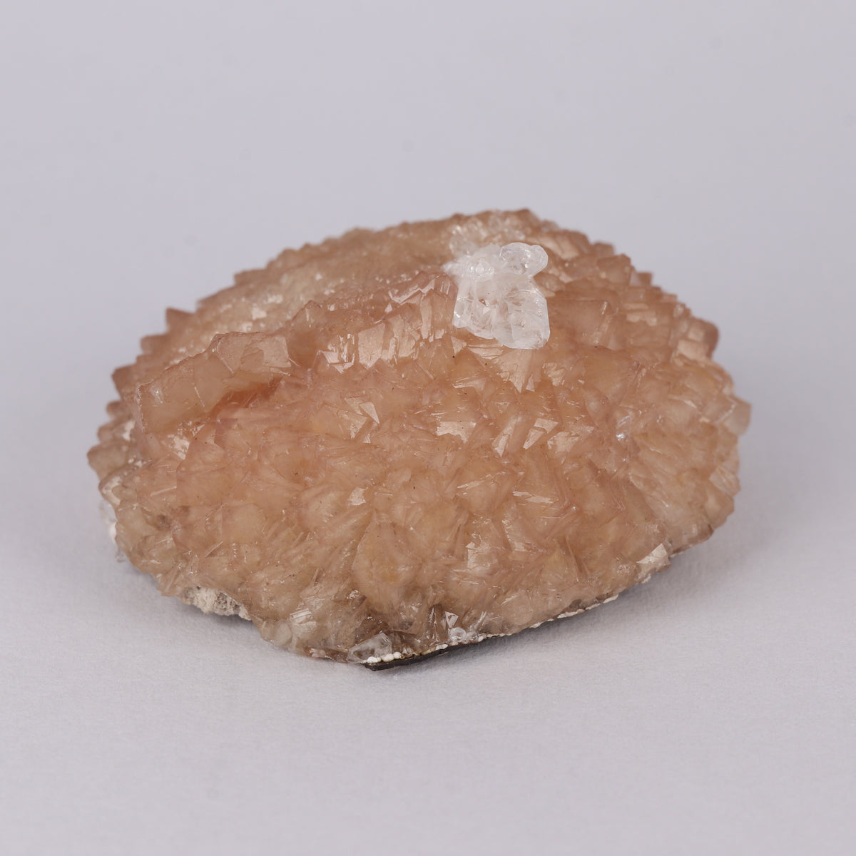 Olmiite on Calcite