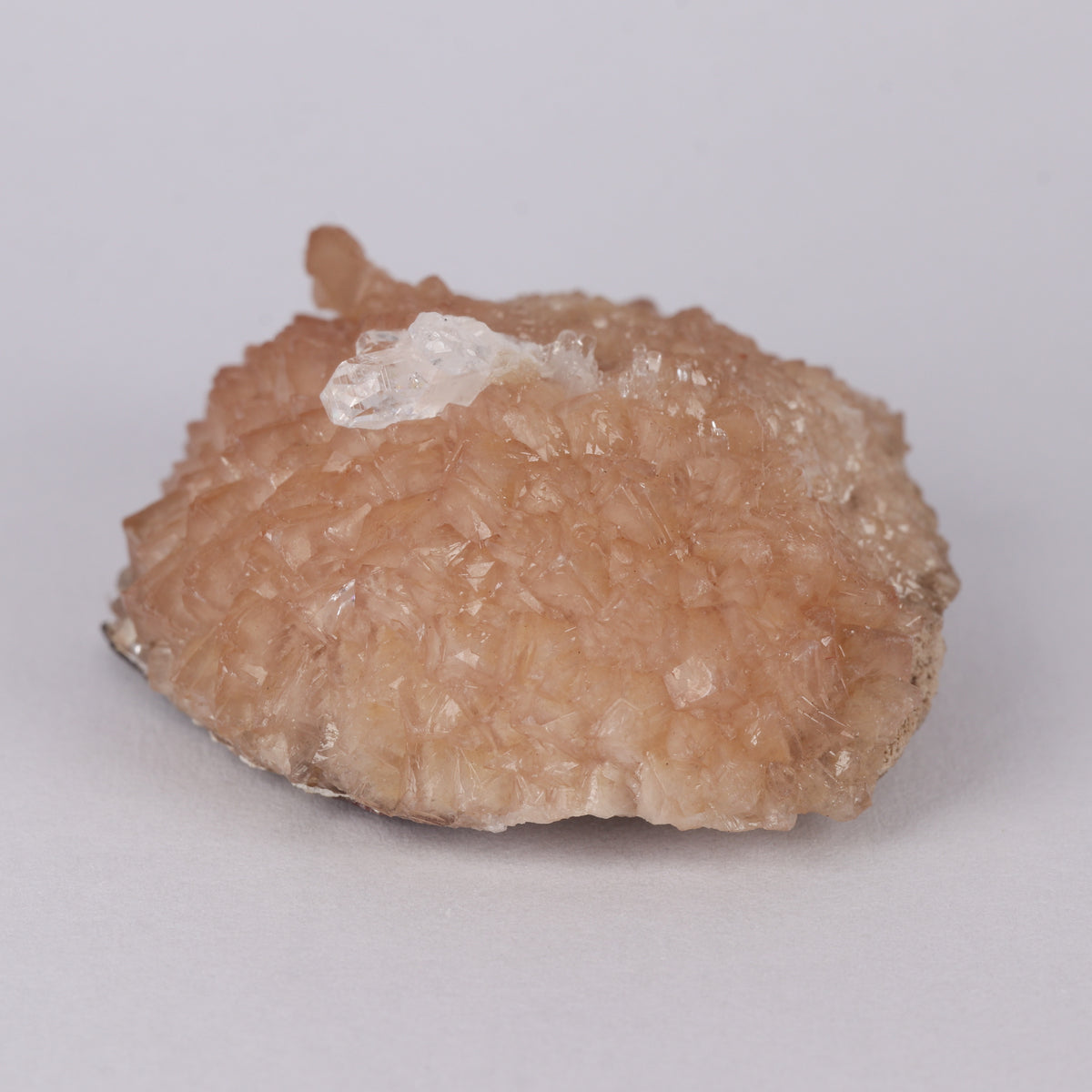 Olmiite on Calcite