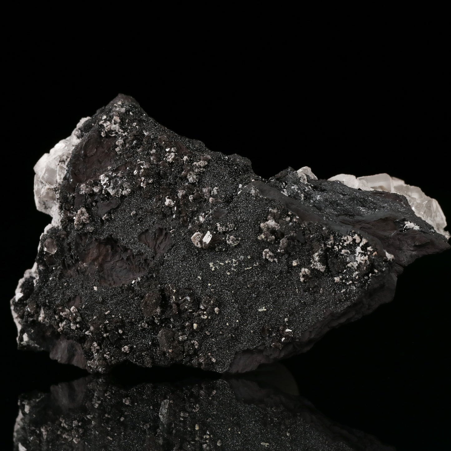 Calcite on Manganite on Matrix, N'Chwaning II Mine, Kalahari Manganese Field, Northern Cape, South Africa.