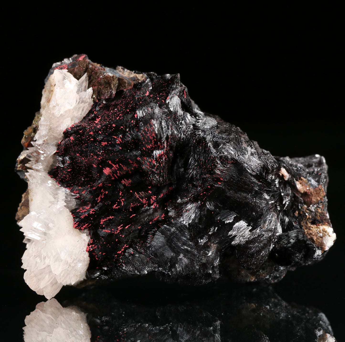 Calcite, Cinnabar on Hausmannite, N'Chwaning II Mine, Kalahari Manganese Field, Northern Cape, South Africa.