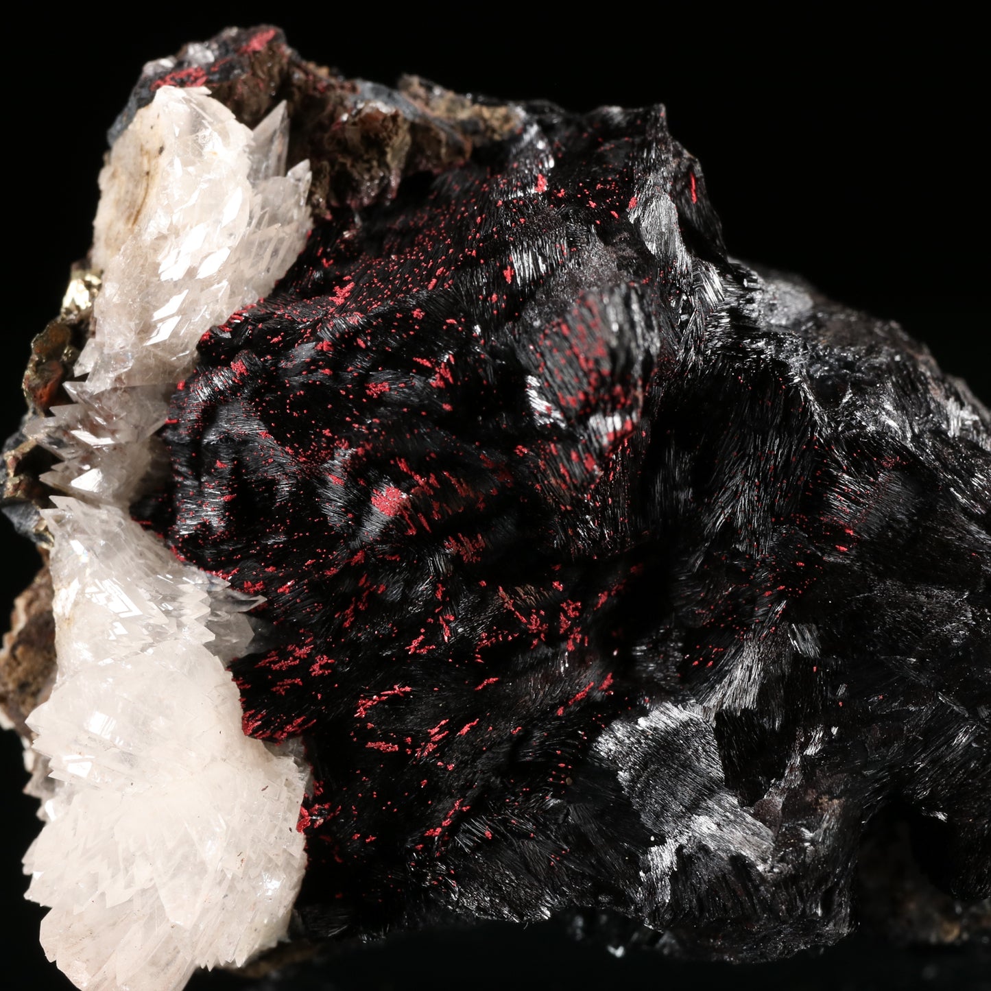 Calcite, Cinnabar on Hausmannite, N'Chwaning II Mine, Kalahari Manganese Field, Northern Cape, South Africa.