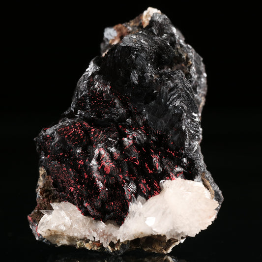 Calcite, Cinnabar on Hausmannite, N'Chwaning II Mine, Kalahari Manganese Field, Northern Cape, South Africa.