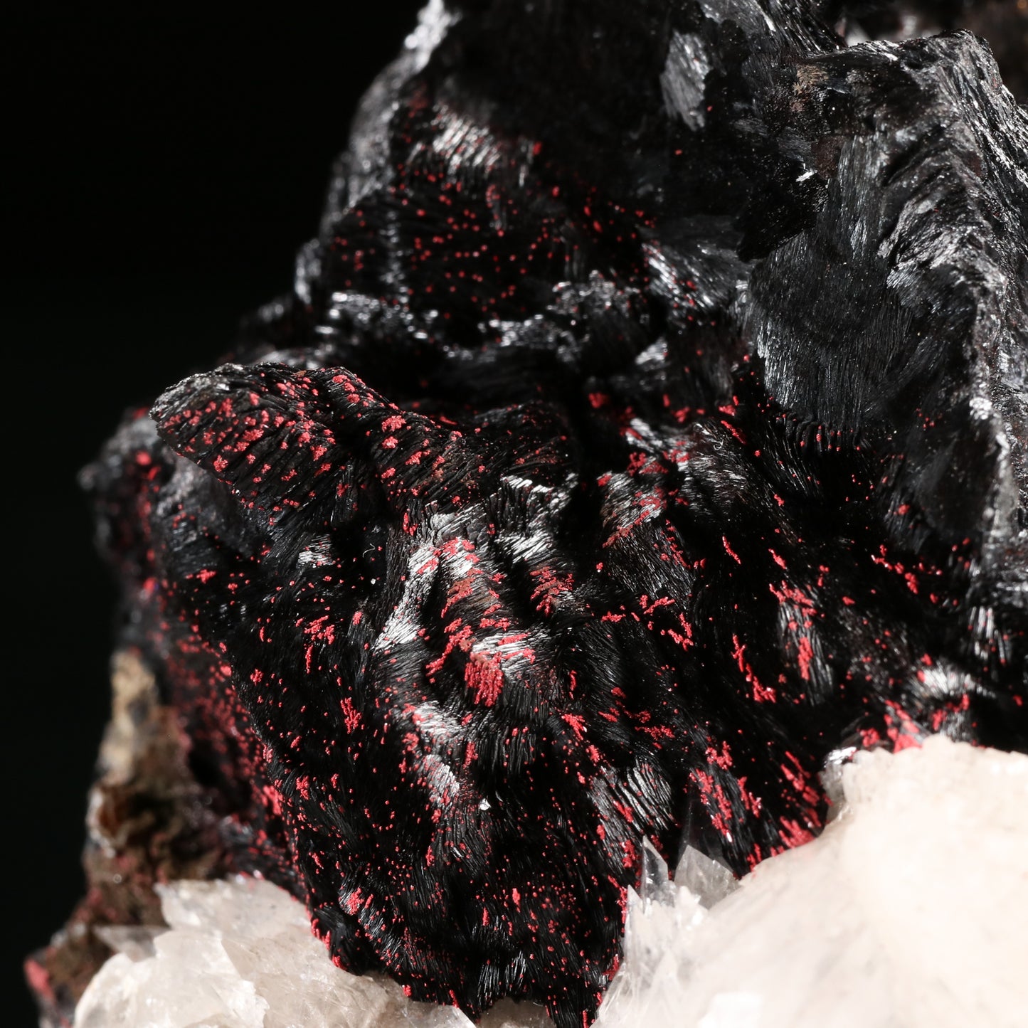 Calcite, Cinnabar on Hausmannite, N'Chwaning II Mine, Kalahari Manganese Field, Northern Cape, South Africa.