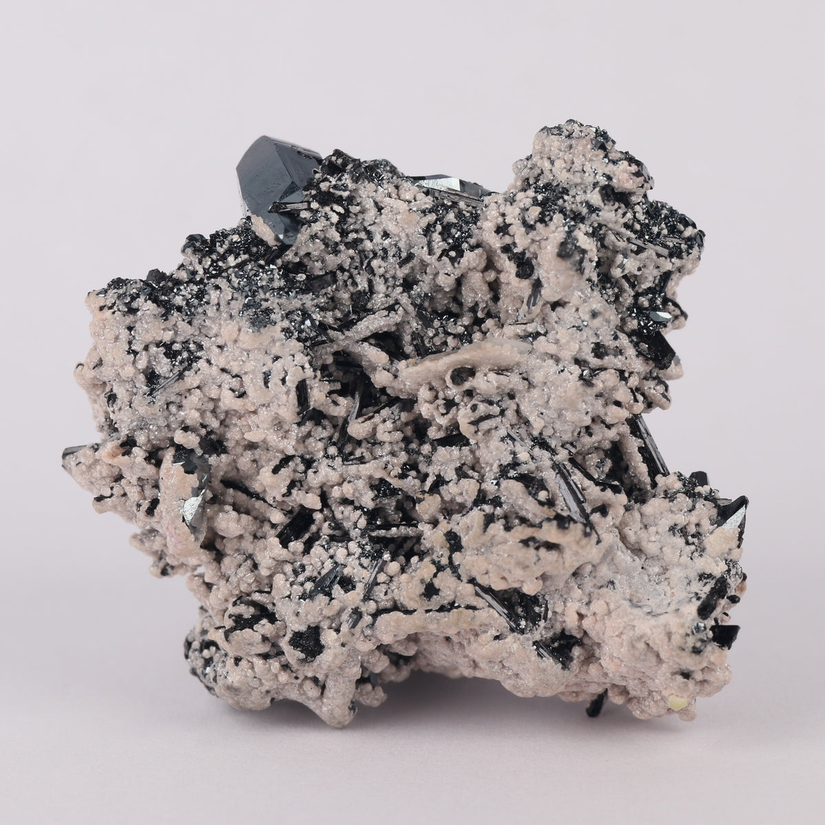 Brucite on Hematite on Gaudefroyite