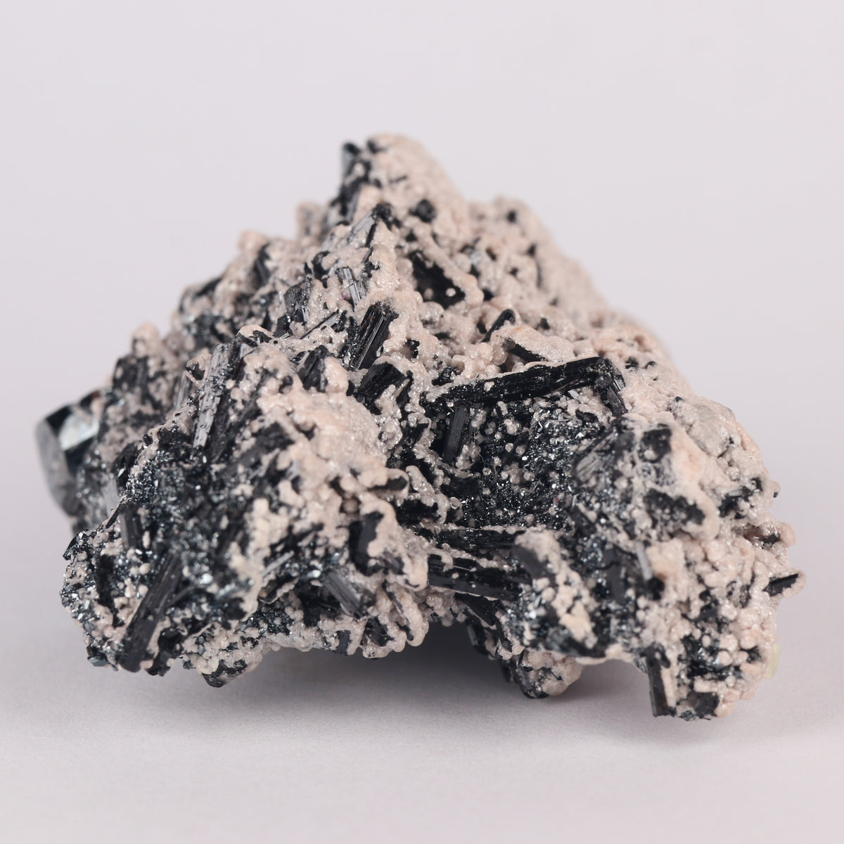Brucite on Hematite on Gaudefroyite