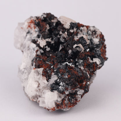 Andradite, Baryte, Hausmannite on Manganvesuvianite