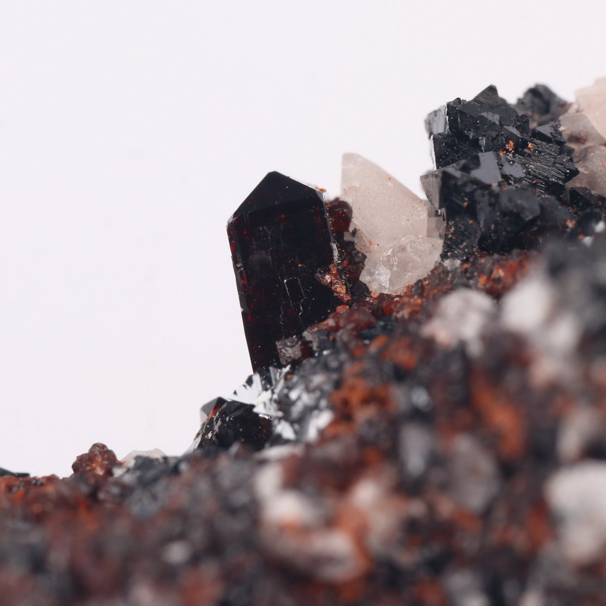 Andradite, Baryte, Hausmannite on Manganvesuvianite