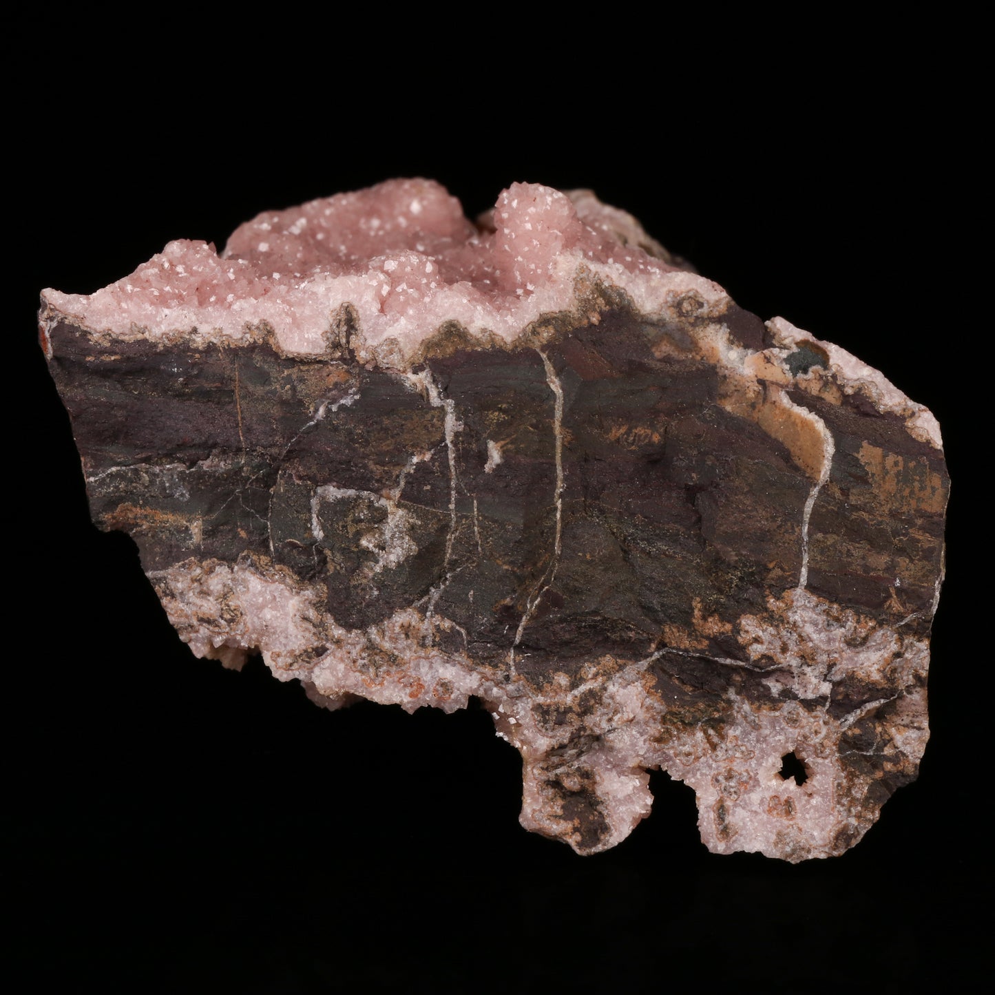 Rhodochrosite on Matrix, N'Chwaning II Mine, Kalahari Manganese Field, Northern Cape, South Africa.