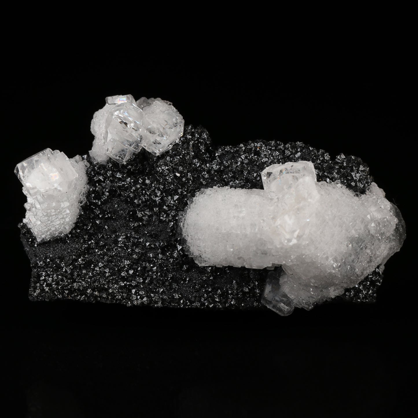 Calcite on Hausmannite, N'Chwaning II Mine, Kalahari Manganese Field, Northern Cape, South Africa.