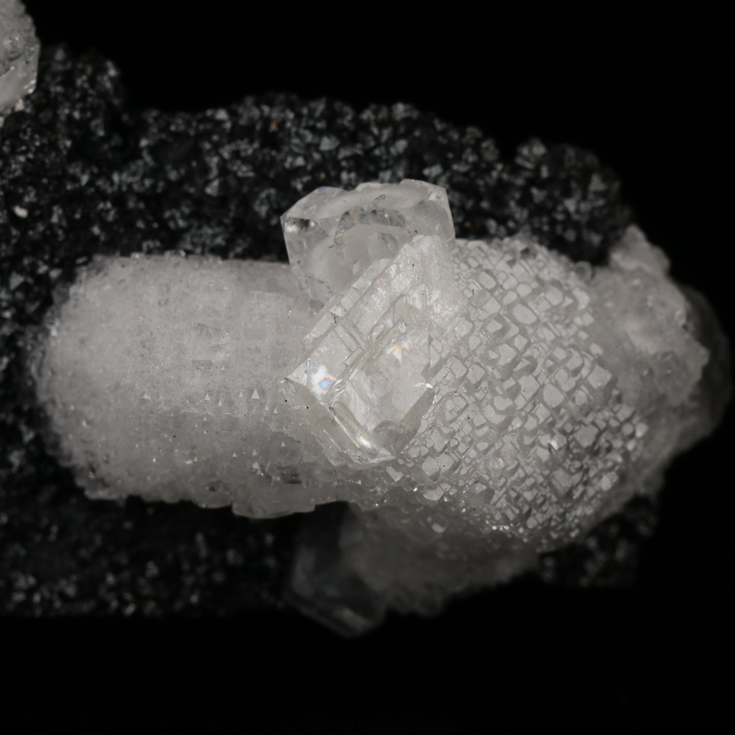 Calcite on Hausmannite, N'Chwaning II Mine, Kalahari Manganese Field, Northern Cape, South Africa.