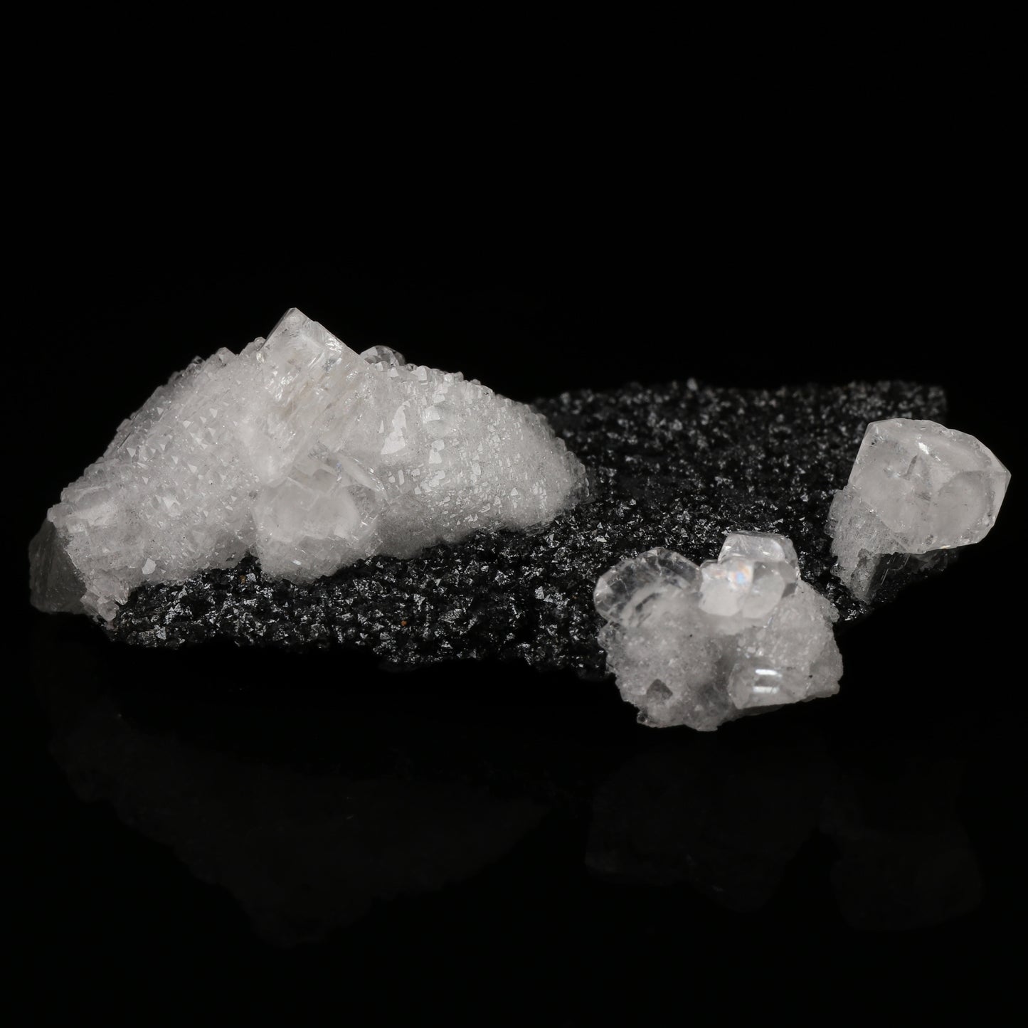 Calcite on Hausmannite, N'Chwaning II Mine, Kalahari Manganese Field, Northern Cape, South Africa.