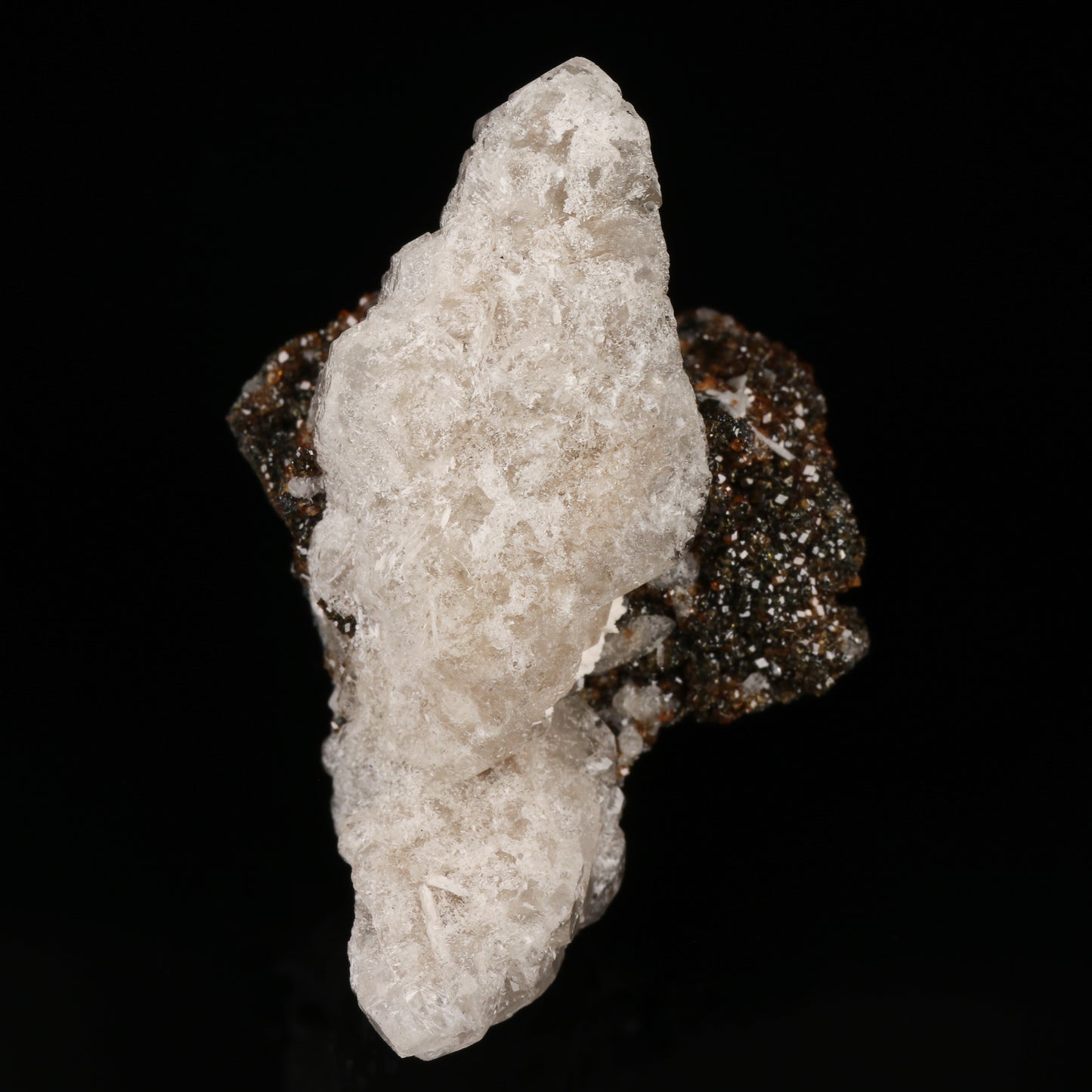 Calcite on Andradite on Matrix, N'Chwaning II Mine, Kalahari Manganese Field, Northern Cape, South Africa.