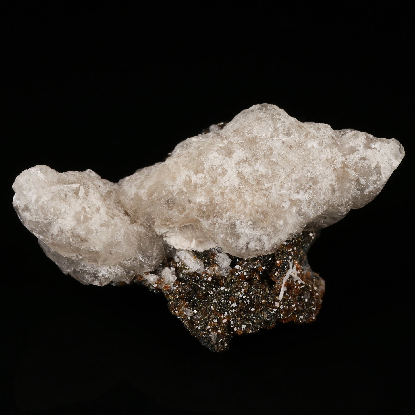 Calcite on Andradite on Matrix, N'Chwaning II Mine, Kalahari Manganese Field, Northern Cape, South Africa.