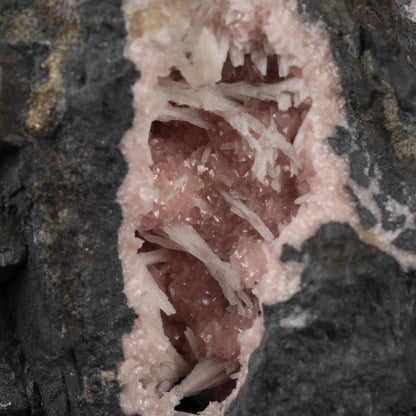 Calcite on Rhodochrosite on Matrix