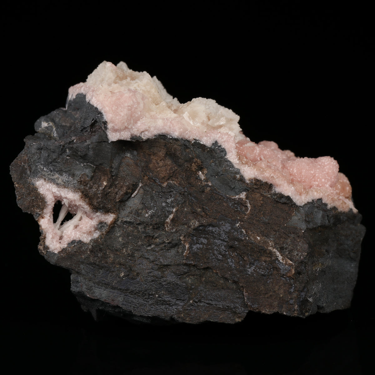 Calcite on Rhodochrosite on Matrix