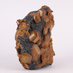 Sturmanite, Hematite on Matrix