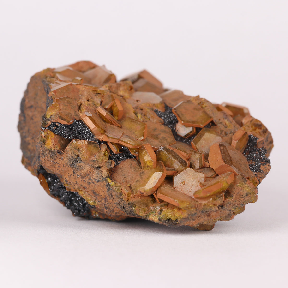 Sturmanite, Hematite on Matrix