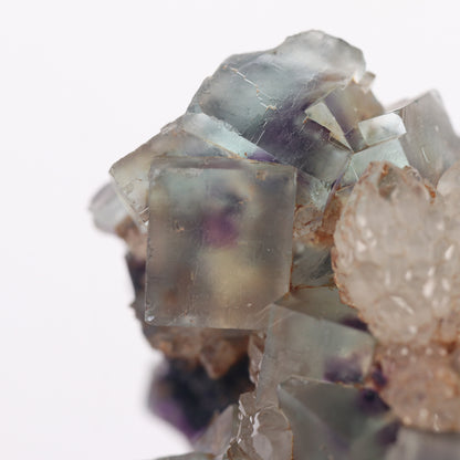 Quartz on Fluorite