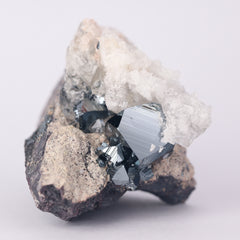 Calcite, Hematite on Matrix