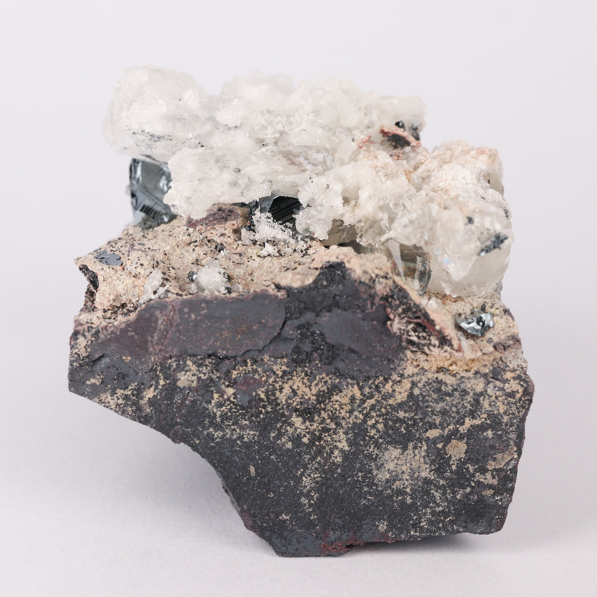 Calcite, Hematite on Matrix